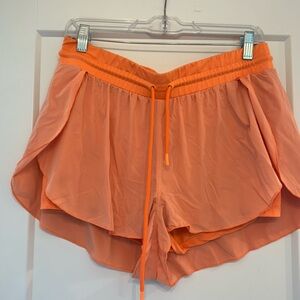 Free People Orange Athletic Shorts with Ruffled Hem
